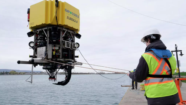 The robot made by Impossible Metals prepares to enter the water in Collingwood, Canada. Photo: John Wong / AFP
