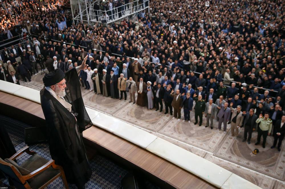 A handout picture provided by the Iranian supreme leader Ayatollah Ali Khamenei's office shows him waving during a ceremony on the occasion of 36rd death anniversary of Ayatollah Ruhollah Khomeini, in Tehran on June 4, 2025. Khamenei vowed on June 18, 2025 that his country would show no mercy towards Israel's rulers, hours after US President Donald Trump demanded Tehran's "unconditional surrender". (Photo by KHAMENEI.IR / AFP)