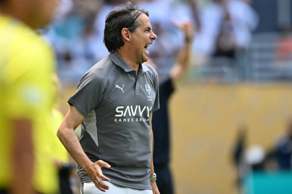 Al Hilal's Italian head coach Simone Inzaghi gestures during the FIFA Club World Cup 2025 Group H football match between Spain's Real Madrid and Saudi's Al-Hilal at the Hard Rock stadium in Miami on June 18, 2025. (Photo by CHANDAN KHANNA / AFP)