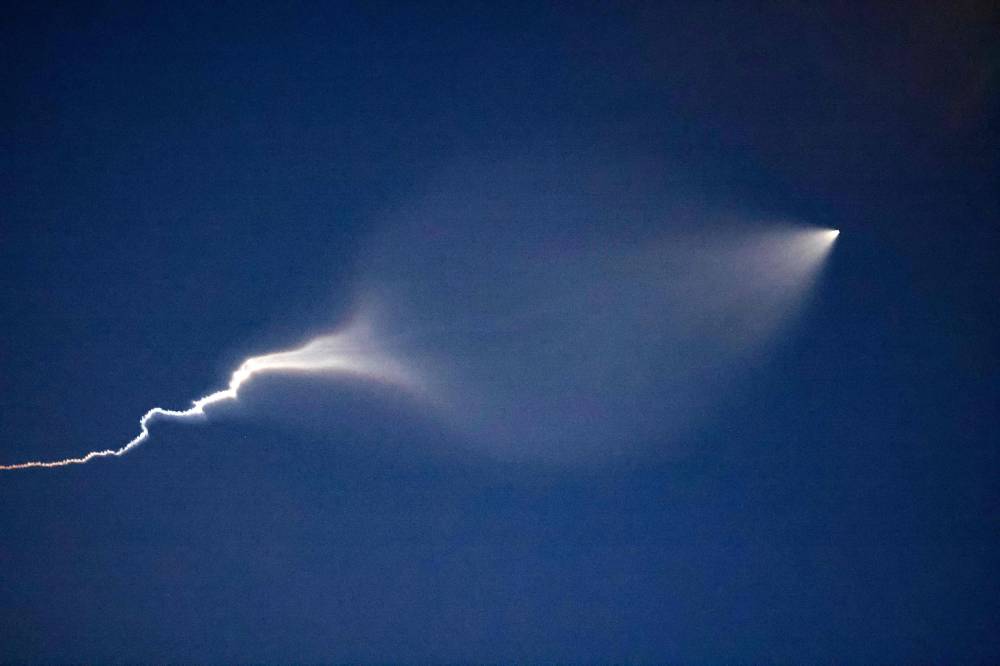 A missile is fired from Iran toward Israel on June 18, 2025, on the sixth day of fighting between Iran and Israel. (Photo by ATTA KENARE / AFP)