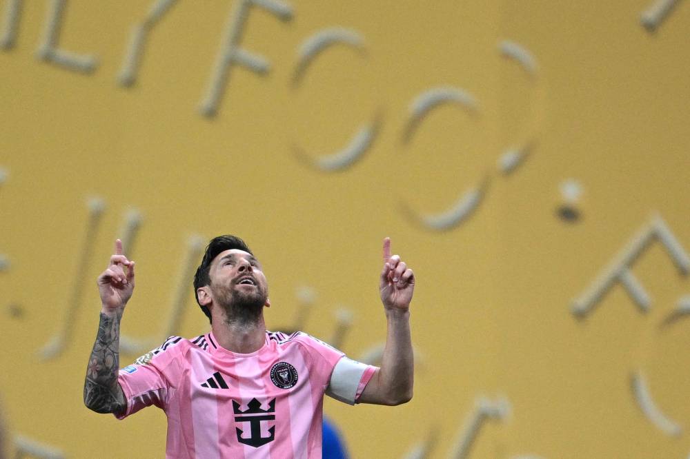 Inter Miami's Argentine forward #10 Lionel Messi celebrates after scoring a goal during the FIFA Club World Cup 2025 Group A football match between US Inter Miami and Portugal's FC Porto at the Mercedes-Benz stadium in Atlanta on June 19, 2025. (Photo by Federico PARRA / AFP)