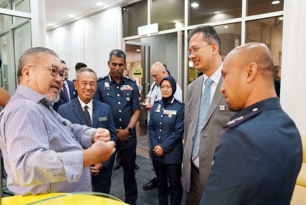 Chief Secretary of Treasury Datuk Johan Mahmood Merican during his visit to the Customs Call Centre under the Corporate Planning Division at the Royal Malaysian Customs Department, Kuala Lumpur on Wednesday.