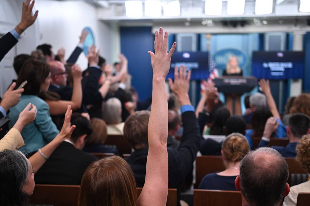 White House Press Secretary Karoline Leavitt takes questions from reporters during the daily briefing in the Brady Briefing Room of the White House in Washington, DC, on June 19, 2025. US President Donald Trump on Thursday said he will decide whether to attack Iran within a fortnight, as Israel and its regional rival continued to trade fire for a seventh day. (Photo by Alex WROBLEWSKI / AFP)