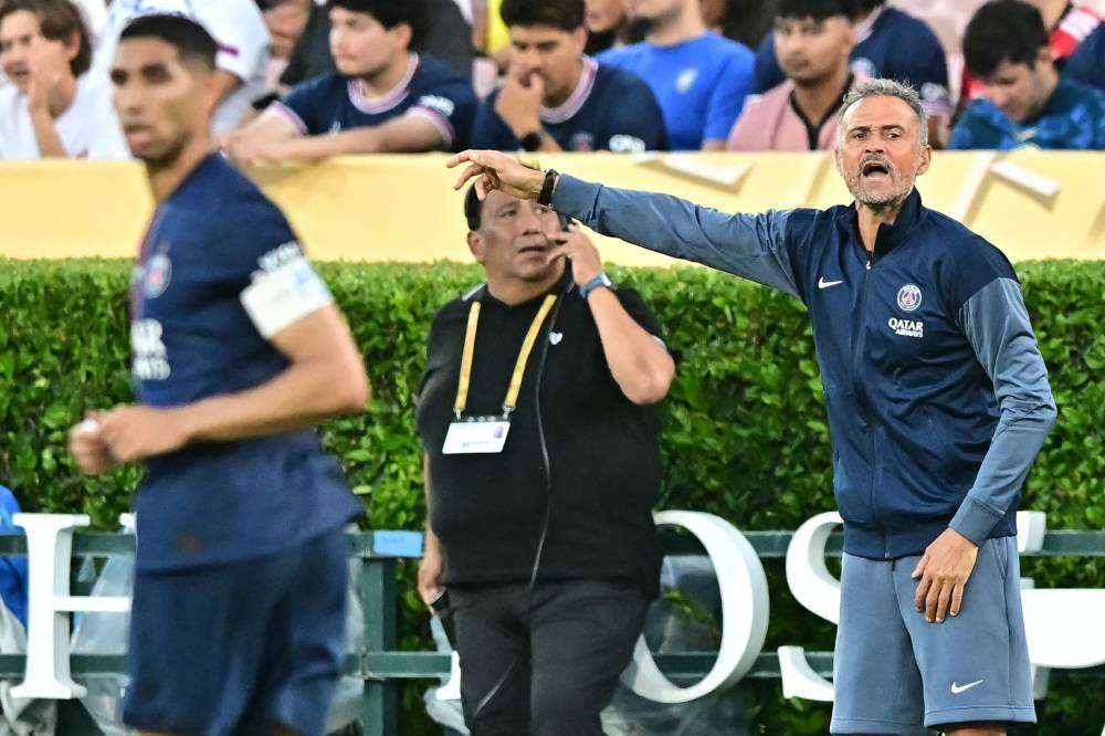 Paris Saint-Germain's Spanish coach Luis Enrique gestures during the FIFA Club World Cup 2025 Group B football match between France's Paris Saint-Germain and Brazil's Botafogo at the Rose Bowl stadium in Los Angeles on June 19, 2025. (Photo by Frederic J. Brown / AFP)