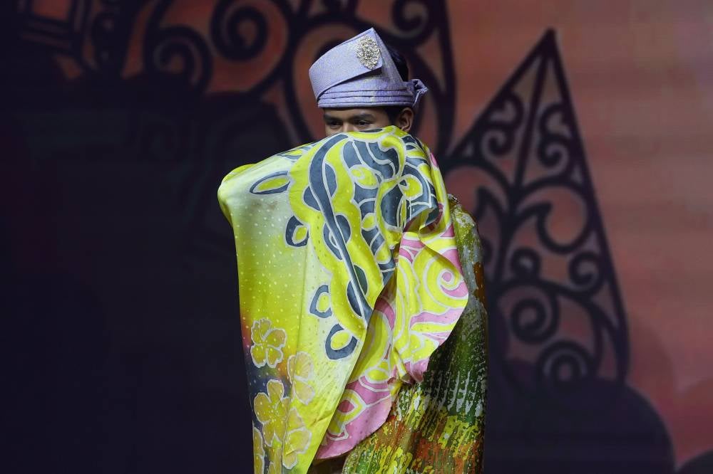 The mandatory implementation of batik attire for civil servants since 2023 has sparked a resurgence of interest in this traditional textile, aiming to preserve and strengthen Malaysian cultural heritage. - Bernama file photo