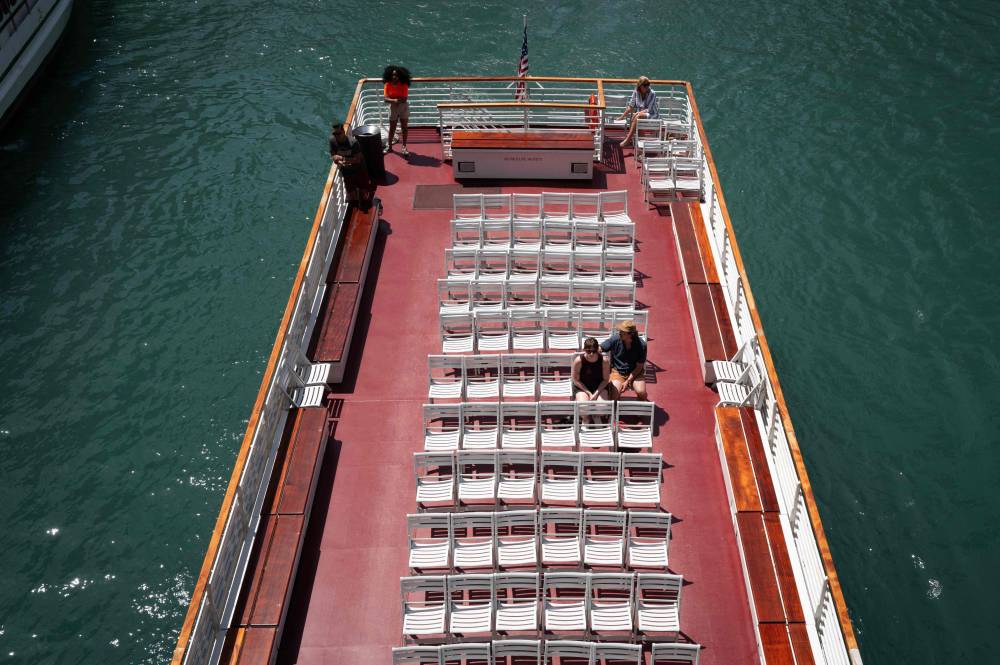 Few people opted for the upper deck on a tour on the Chicago River as temperatures climbed into the mid-90s on June 23, 2025 in Chicago, Illinois. (Photo by SCOTT OLSON / GETTY IMAGES NORTH AMERICA / Getty Images via AFP)