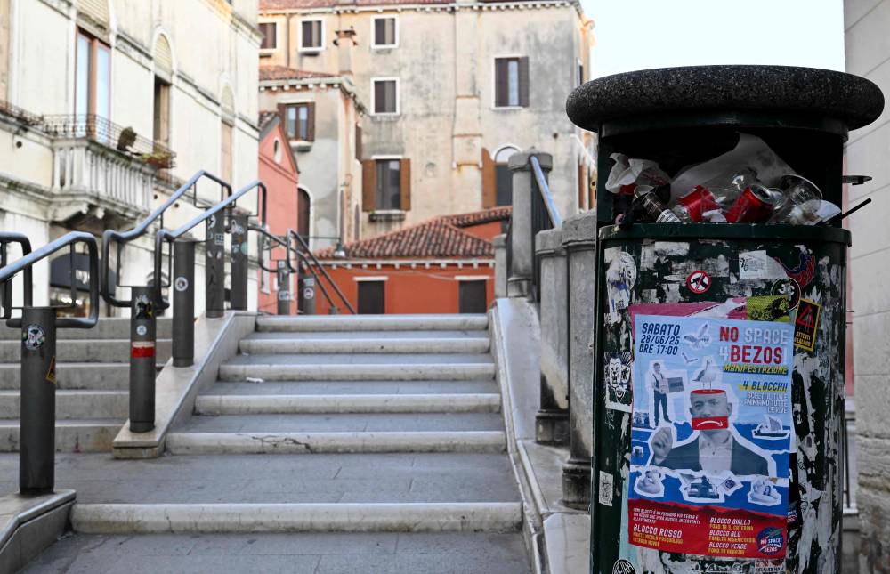 This picture taken on June 24, 2025 shows a poster reading 