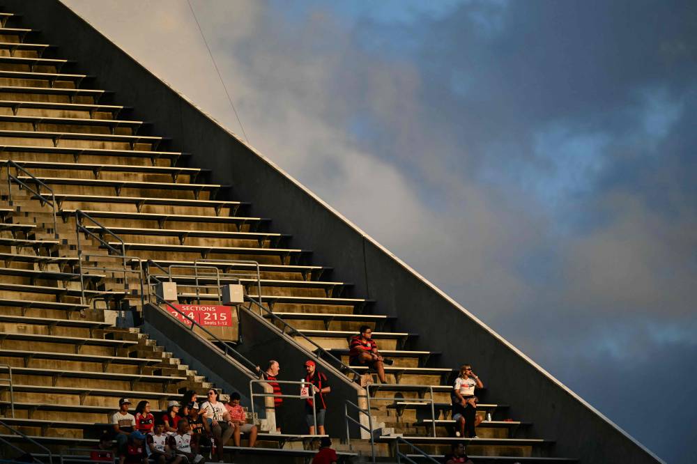 Fans of Flamengo sit in their stands ahead of the FIFA Club World Cup 2025 Group D football match between US Los Angeles FC and Brazil's CR Flamengo at the Camping World stadium in Orlando on June 24, 2025. (Photo by PATRICIA DE MELO MOREIRA / AFP)