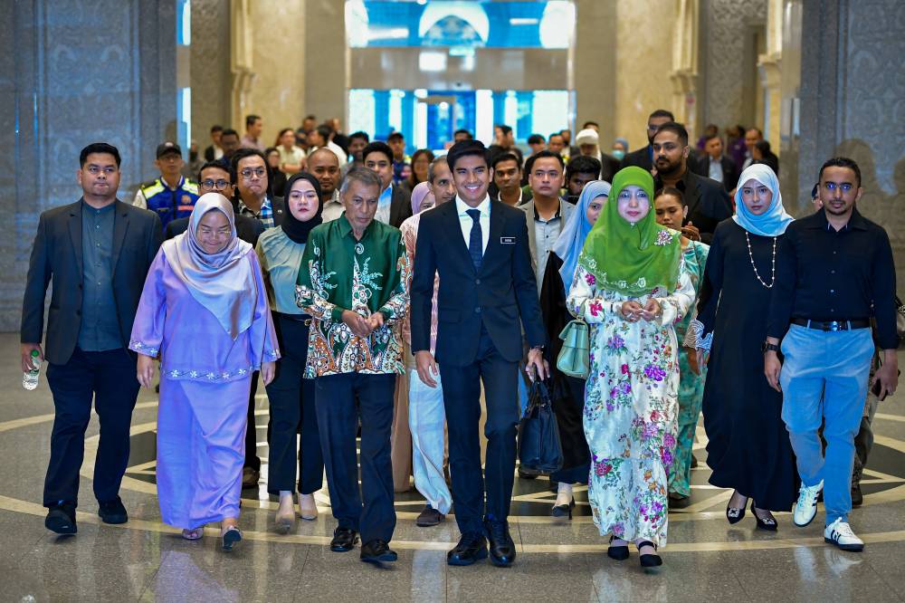The Court of Appeal yesterday acquitted and discharged Muar MP Syed Saddiq Syed Abdul Rahman (centre) of four charges involving criminal breach of trust, misappropriation of property and money laundering linked to funds from Angkatan Bersatu Anak Muda. - Photo by Bernama