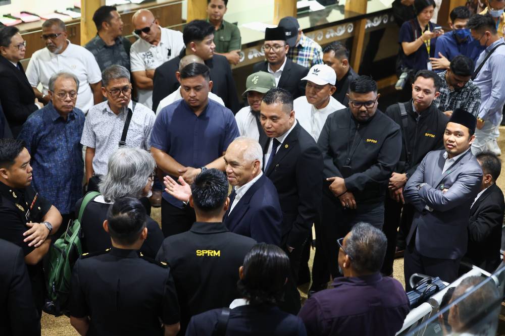 Sindumin assemblyman Datuk Dr Yusof @ Josree Yacob (left) and Tanjung Batu assemblyman Datuk Andi Muhammad Suryady Bandy at the Kota Kinabalu Courts Complex, today. - Photo by Bernama