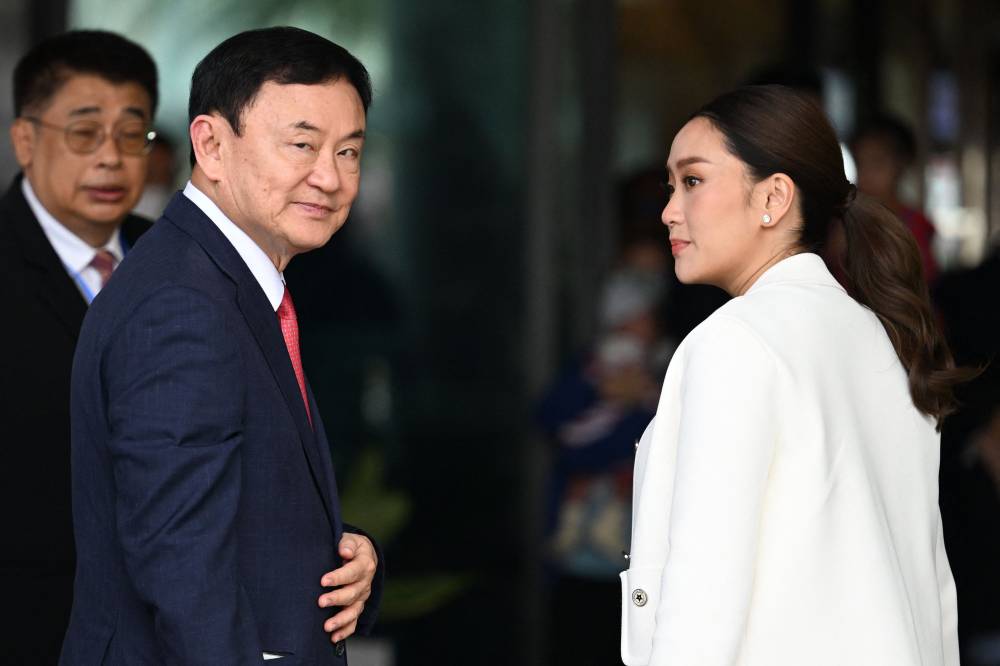 Thai Prime Minister Paetongtarn Shinawatra was suspended by the country's Constitutional Court on July 1, 2025, as it opened a probe into her conduct in a diplomatic spat with Cambodia. The blow to 38-year-old Paetongtarn came on the same day that her father, former premier Thaksin Shinawatra faced a criminal court over allegations of royal defamation. (Photo by Manan VATSYAYANA / AFP)