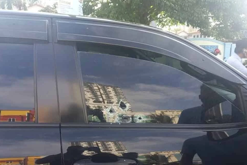 Images circulating on social media show at least five bullet holes on the driver’s side window.