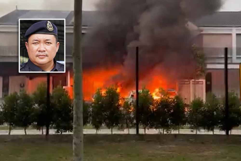 Screenshot of video footage showing the arson incident at a house in Bandar Saujana Putra, Kuala Langat on Tuesday. Small photo: Mohd Akmalrizal.