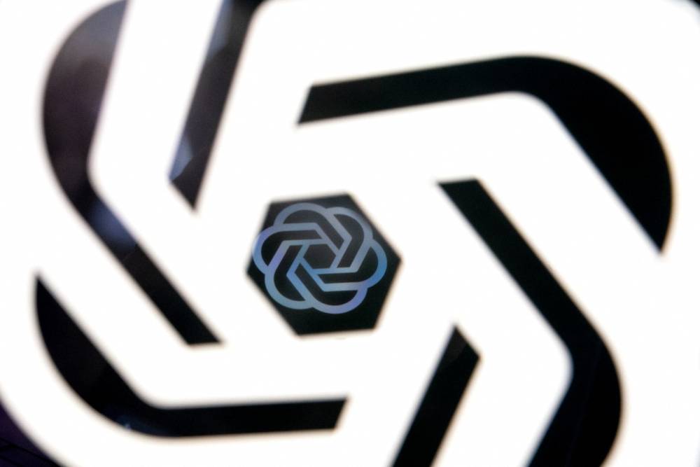 This photo illustration shows the ChatGPT logo at an office in Washington, DC, on March 15, 2023. - (Photo by Stefani Reynolds / AFP)