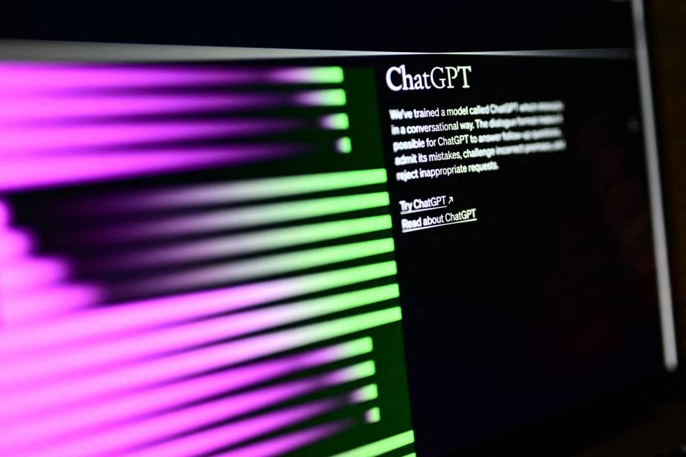 A photo taken on March 31, 2023 in Manta, near Turin, shows a computer screen with the home page of the artificial intelligence OpenAI web site, displaying its chatGPT robot. - (Photo by MARCO BERTORELLO / AFP)