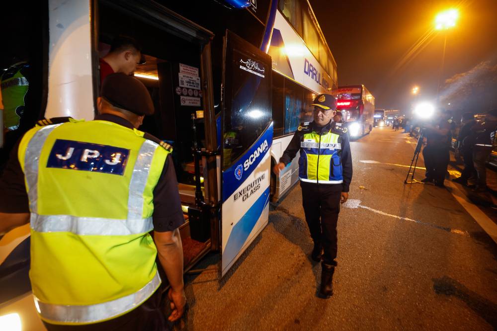 A total of 23 express bus passengers were issued compounds for not wearing seat belts, involving 20 locals and three foreigners. - Bernama photo