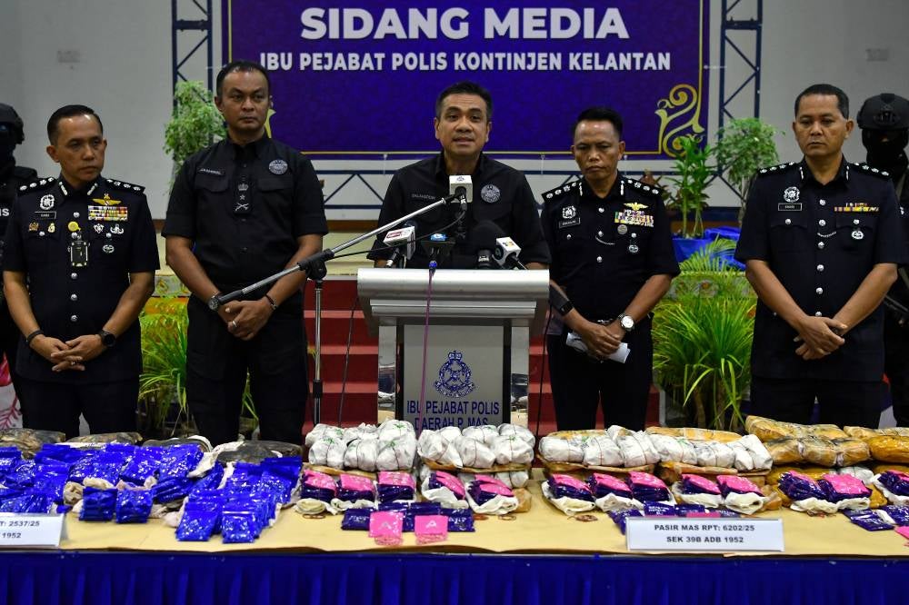 Police busted a 'pil kuda' drug trafficking syndicate and seized drugs weighing over 35.4 kilograms (kg), valued at RM5.04 million, through six raids in Pasir Mas and Tumpat last Friday. Photo by Bernama