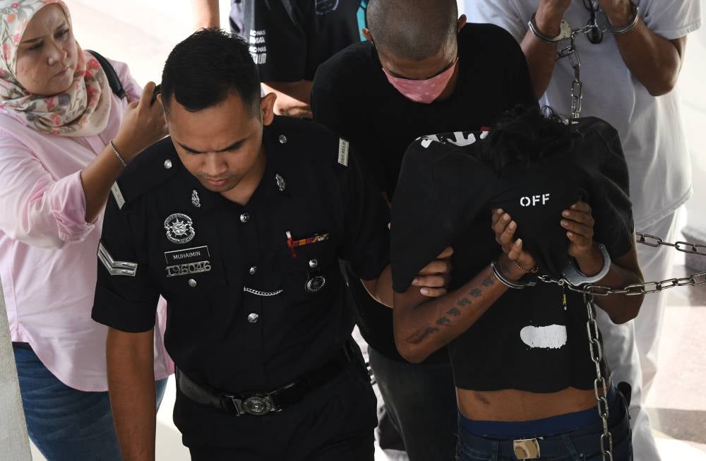 S. Prasanth, 25, (right) pleaded guilty at the Sessions Court today to two charges of raping and committing unnatural sex with an Australian national last week. Photo by Bernama