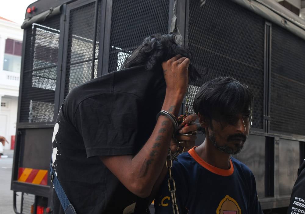 S. Prasanth, 25, (right) pleaded guilty at the Sessions Court today to two charges of raping and committing unnatural sex with an Australian national last week. Photo by Bernama