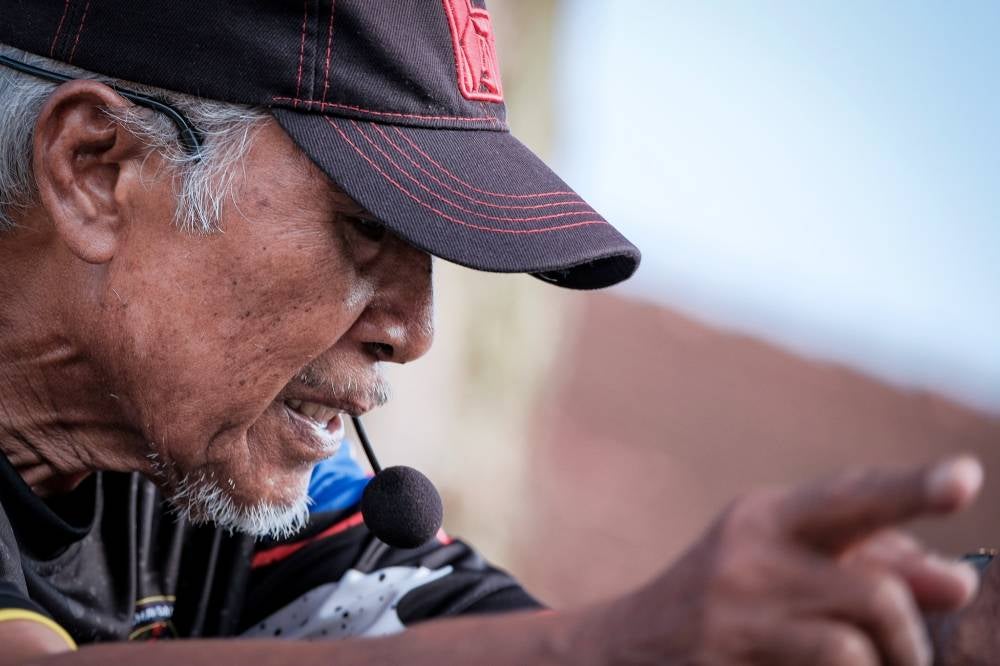Aerobics instructor, Syed Abdul Rahman Syed Jaafar, leads an aerobics workout session with members of the public at Taman Merdeka. - Bernama photo