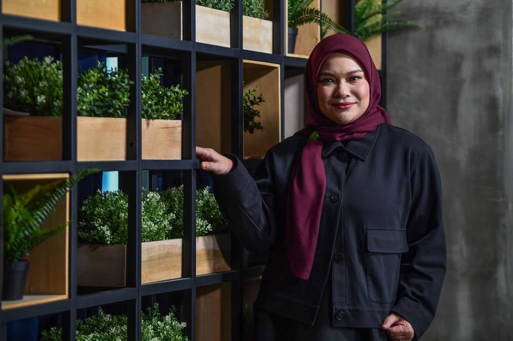 Renowned singer, Nora Ariffin, shares her life story during the recording of the Hidup Ini Keras podcast recently. - Bernama photo
