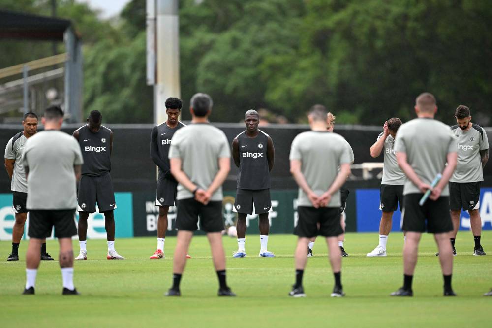 Chelsea's players observe a minute of silence after the death of Liverpool forward Diogo Jota during a training session at Barry University in Miami on July 3, 2025, ahead of the FIFA Club World Cup 2025 quarterfinal football match between Brazil's Palmeiras and England's Chelsea at the Lincoln Financial Field Stadium in Philadelphia on July 4. (Photo by Chandan KHANNA / AFP)