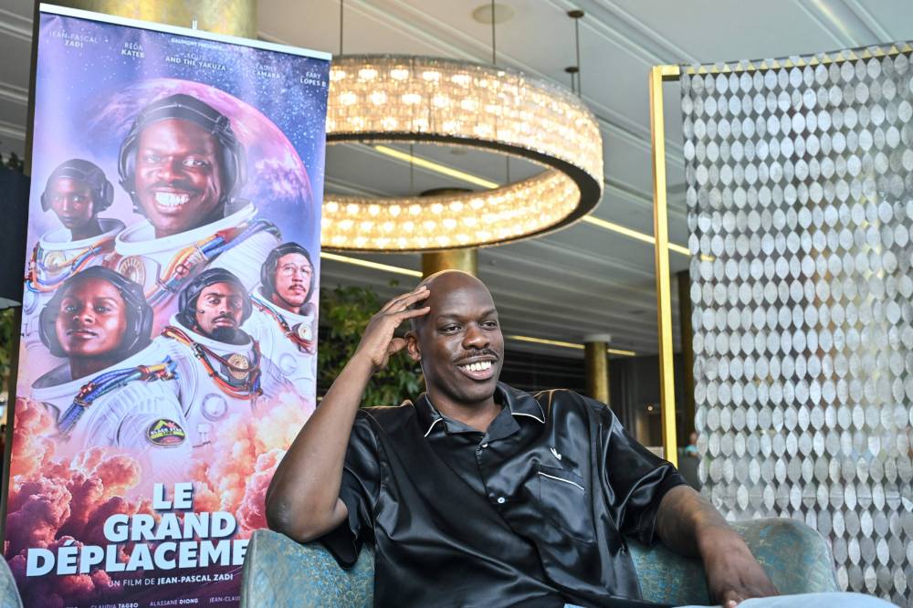 Franco-Ivorian director Jean-Pascal Zadi speaks during an interview in Abidjan on June 28, 2025. In the shadow of Nigeria's towering Nollywood and its prolific productions, Ivory Coast has been striving to establish itself as an attractive destination for filmmaking on the African continent. (Photo by Issouf SANOGO / AFP)