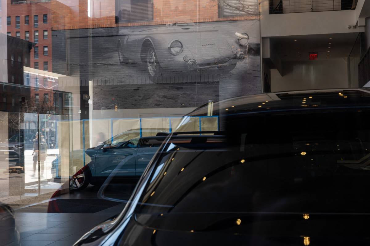 New Porsches are displayed at a dealership in Manhattan on April 01, 2025 in New York City. (Photo by SPENCER PLATT / GETTY IMAGES NORTH AMERICA / Getty Images via AFP)