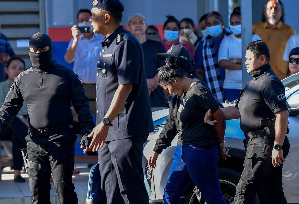 M. Sri Darvien, who does odd jobs, was charged with murdering Maniishapriet Kaur Akhara, 20, at a condominium in Cyberjaya between 9.11 pm and 11.31 pm on June 23. - Bernama photo