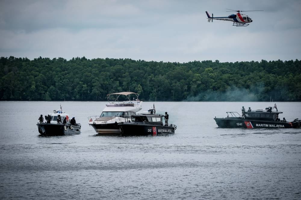 A police helicopter performing a fly-past simulation in conjunction with the Malaysia-Indonesia-Thailand-Singapore 2025 Nuclear Security Detection Multilateral Training Program (MITSATOM 2025) before being involved in an accident near Sungai Pulai today. - Bernama photo