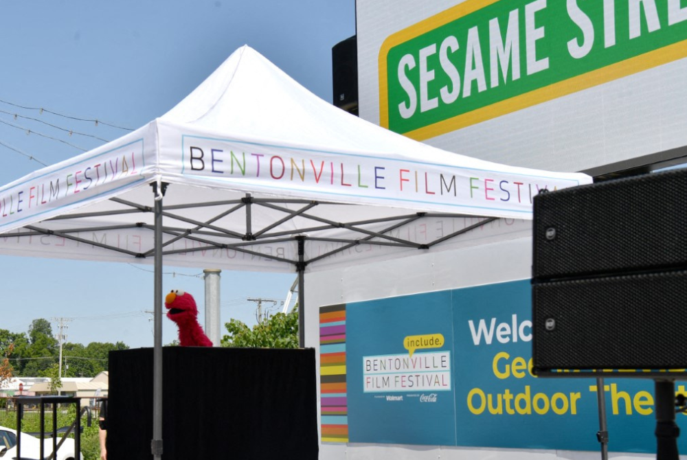 Elmo appears onstage for "Read with Elmo & Geena" during the 11th Annual Bentonville Film Festival led by Geena Davis on June 21, 2025 in Bentonville, Arkansas. (Photo by Jason Davis / GETTY IMAGES NORTH AMERICA / Getty Images via AFP)