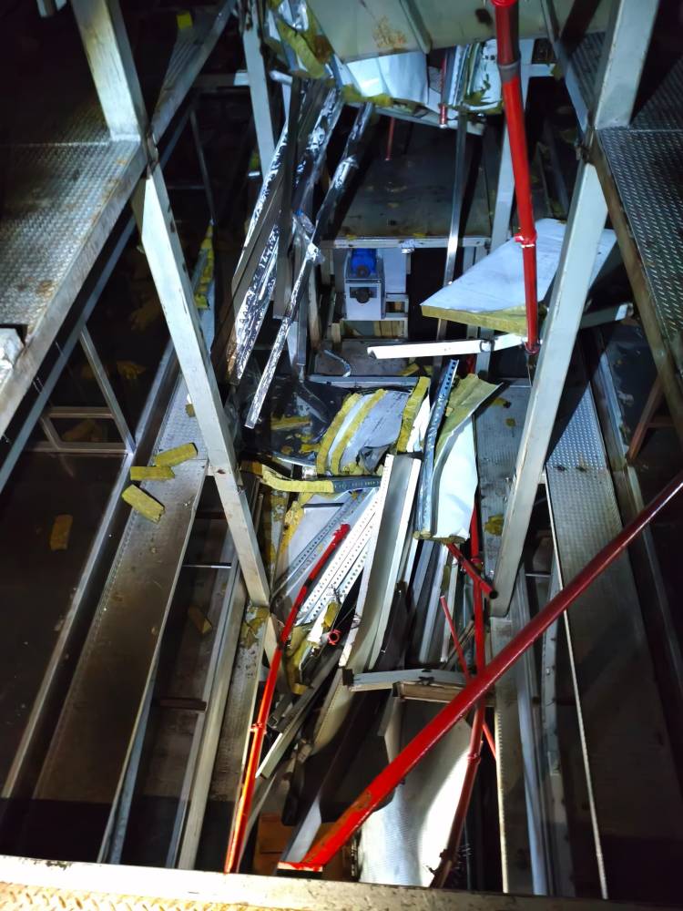 A factory worker was killed this morning after being crushed by a 17-level storage rack at a glove manufacturing plant in Banting, near here. Photo courtesy of Selangor Fire and Rescue Department.