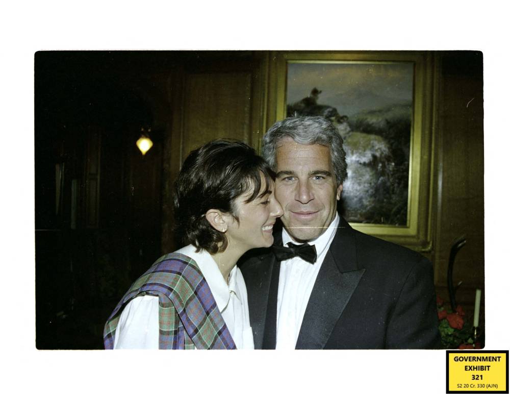 This undated trial evidence image obtained Dec 8, 2021, from the US District Court for the Southern District of New York shows British socialite Ghislaine Maxwell and US financier Jeffrey Epstein. - (Photo by Handout / US District Court for the Southern District of New York / AFP)