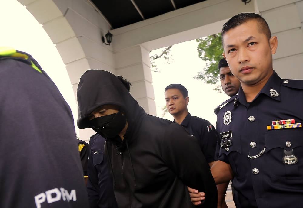 Police officer DSP Mohd Nazri Abdul Razak, pleaded not guilty in the Ipoh High Court to a charge of murdering a Form Five student in a road crash near a school, two years ago. - BERNAMA FILE PIX