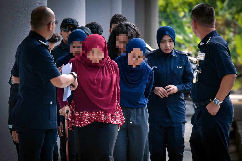 Six individual, including the husband and wife who founded the eHati marriage motivation programme were remanded for three days by the Shah Alam magistrate’s court on Wednesday. - Photo by Bernama