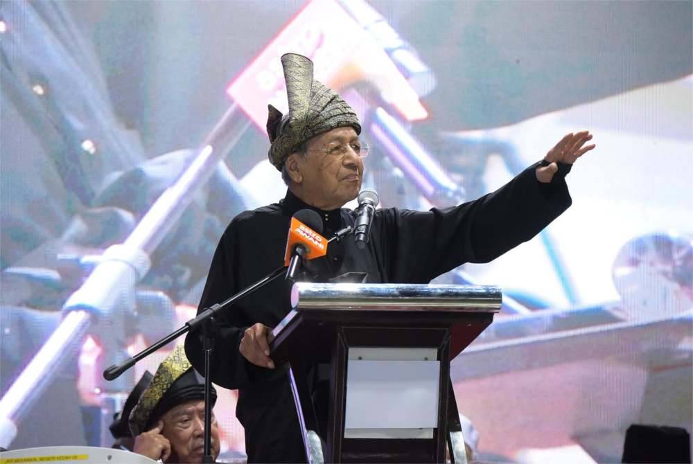 Tun Mahathir speaking at the Himpunan Mandat Negarawan at Stadium Suka Menanti on Thursday.