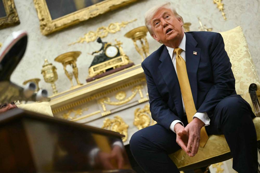 US President Donald Trump speaks during a meeting with Bahraini Crown Prince Salman bin Hamad al-Khalifa in the Oval Office of the White House in Washington, DC, on July 16, 2025. - (Photo by ANDREW CABALLERO-REYNOLDS / AFP)
