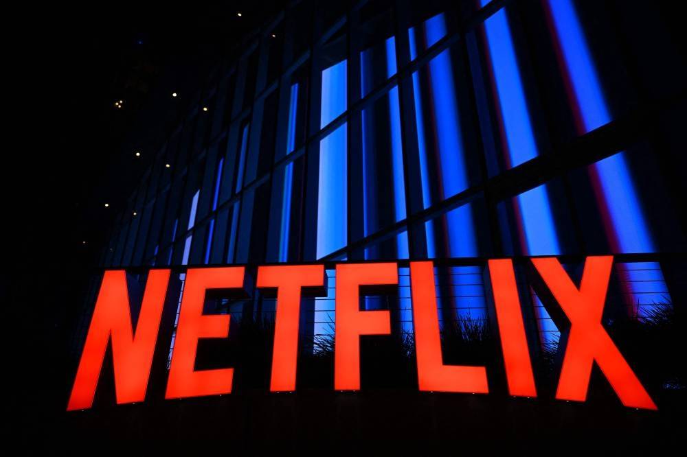 In the third quarter, Netflix expects revenue growth of 17 per cent, driven by growth in members, pricing and advertising revenue, it said in a letter to shareholders. - AFP file photo