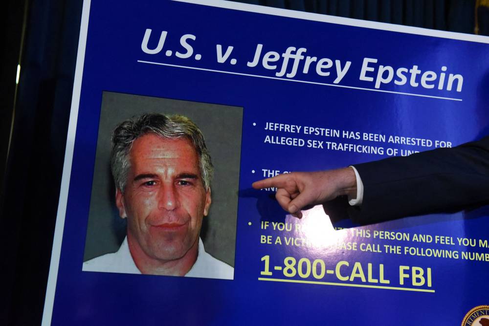 US Attorney for the Southern District of New York Geoffrey Berman points to a photo of Jeffrey Epstein while announcing charges against Epstein during a news conference on July 8, 2019 in New York City. - (Photo by STEPHANIE KEITH / GETTY IMAGES NORTH AMERICA / AFP)