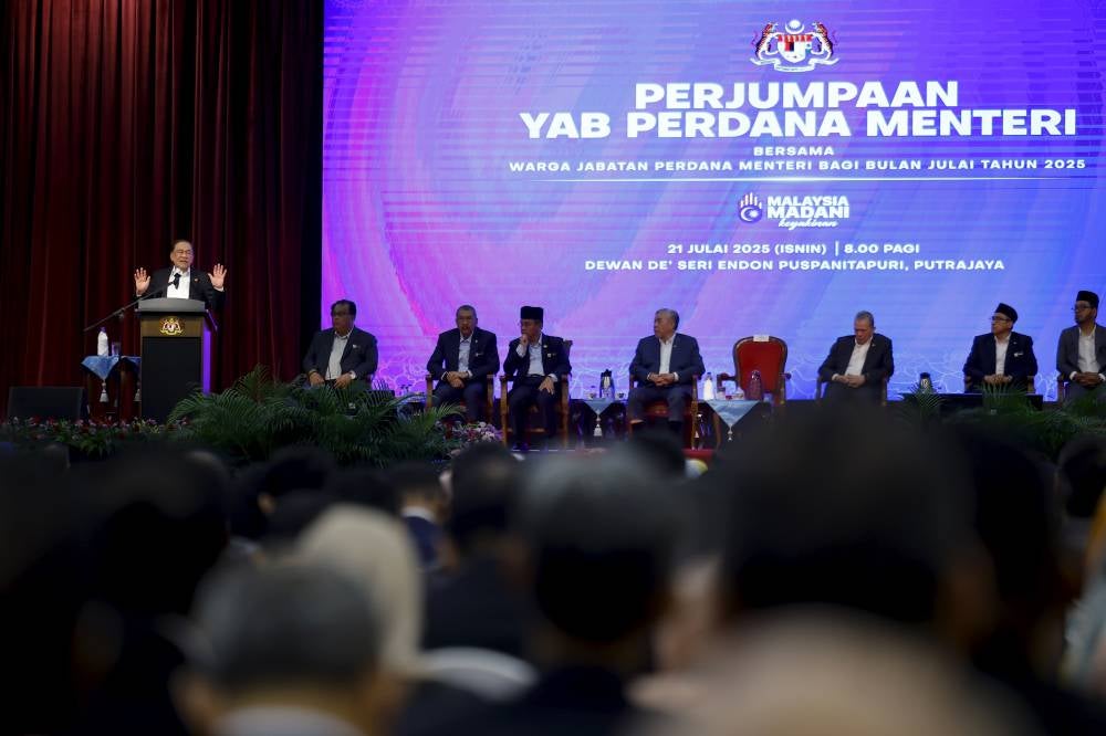 Prime Minister Datuk Seri Anwar Ibrahim delivering his speech during the monthly assembly with staff of the Prime Minister’s Department, today. - Photo by Bernama