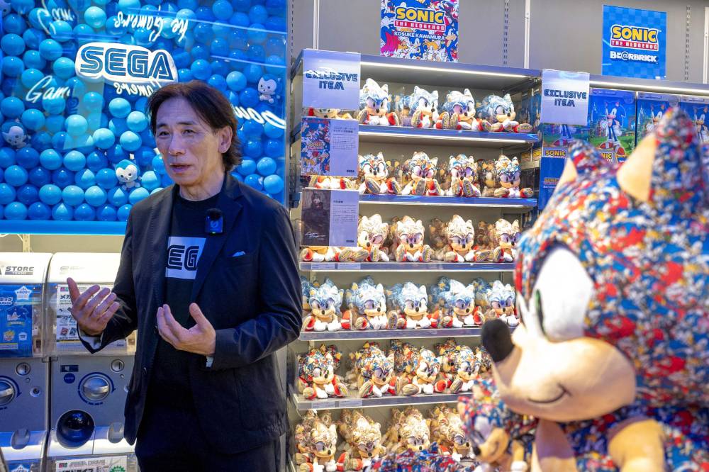Sega President and COO Shuji Utsumi speaks during an interview with AFP at the opening ceremony for the company's first official store in Tokyo's Shibuya district on July 16, 2025. (Photo by Kazuhiro NOGI / AFP)