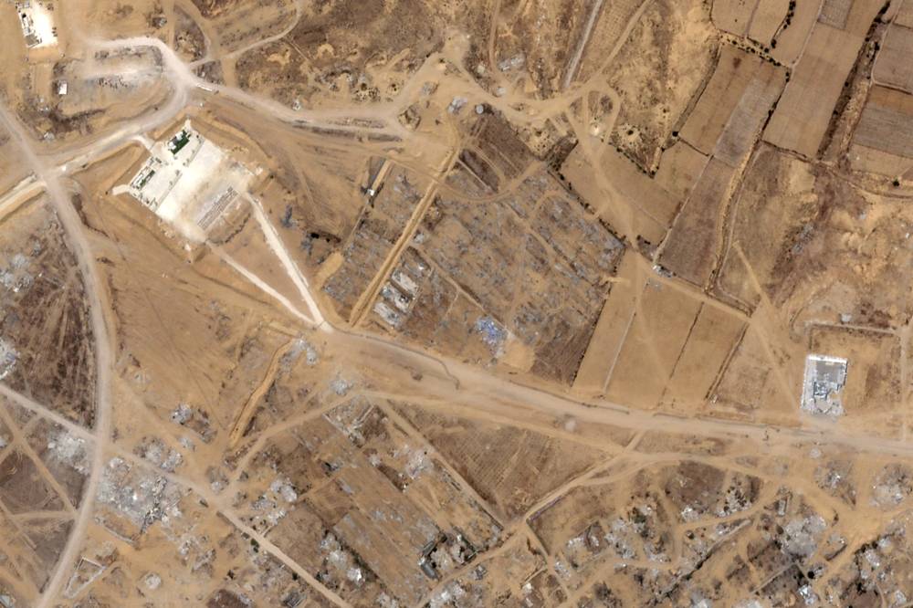 This handout satellite picture obtained from Planet Labs PBC taken on July 25, 2025 shows an aid distribution site affiliated with the Gaza Humanitarian Foundation (GHF) in Khan Yunis in the southern Gaza Strip after the site was emptied. Photo by Planet Labs/AFP