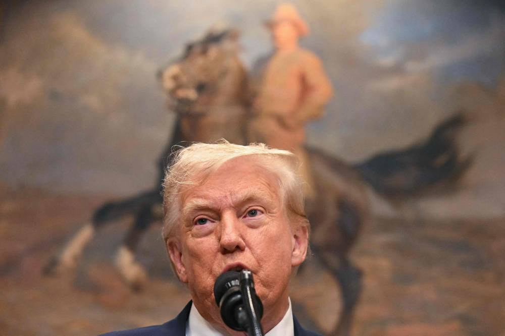 US President Donald Trump speaks before signing the VA Home Loan Program Reform Act in the Roosevelt Room of the White House in Washington, DC, on July 30, 2025. (Photo by Jim WATSON / AFP)