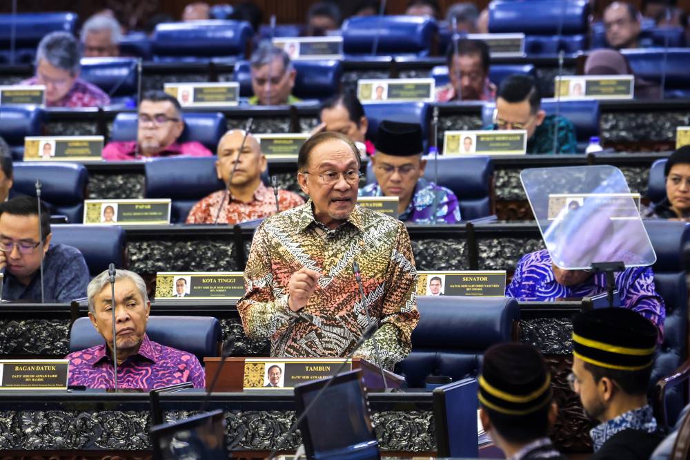Prime Minister Datuk Seri Anwar Ibrahim tables 13th Malaysia Plan (13MP) at Parliament today. Photo by Bernama