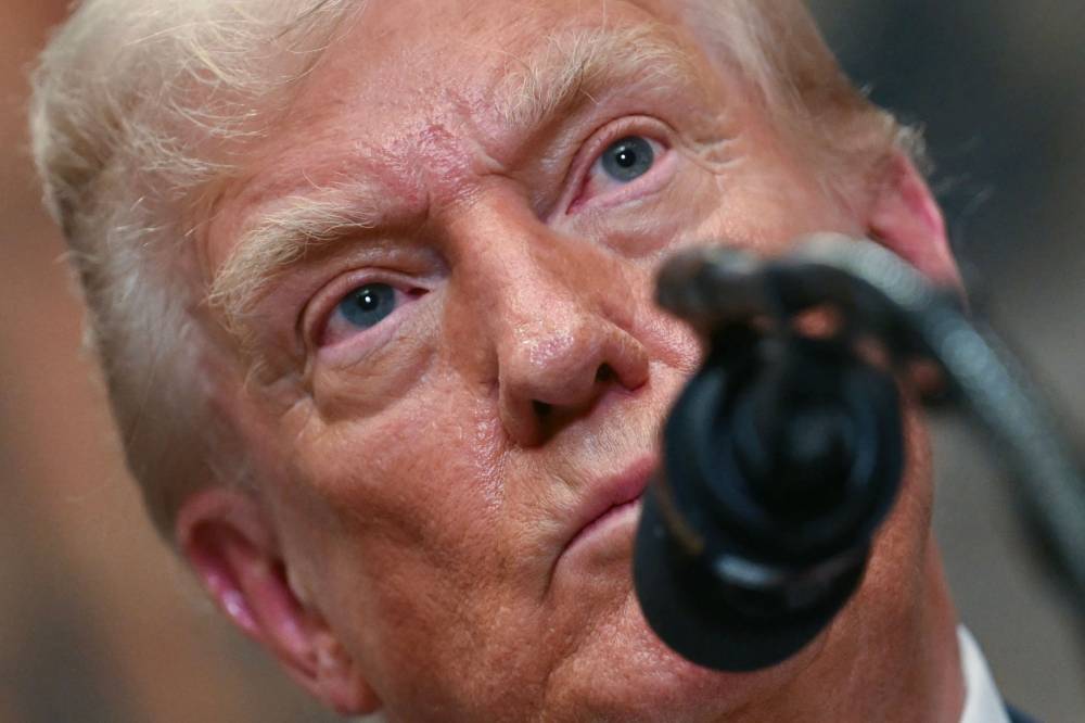 US President Donald Trump speaks after signing an executive order restarting the Presidential Fitness Test in public schools in the Roosevelt Room of the White House in Washington, DC, on July 31, 2025. (Photo by Jim WATSON / AFP)