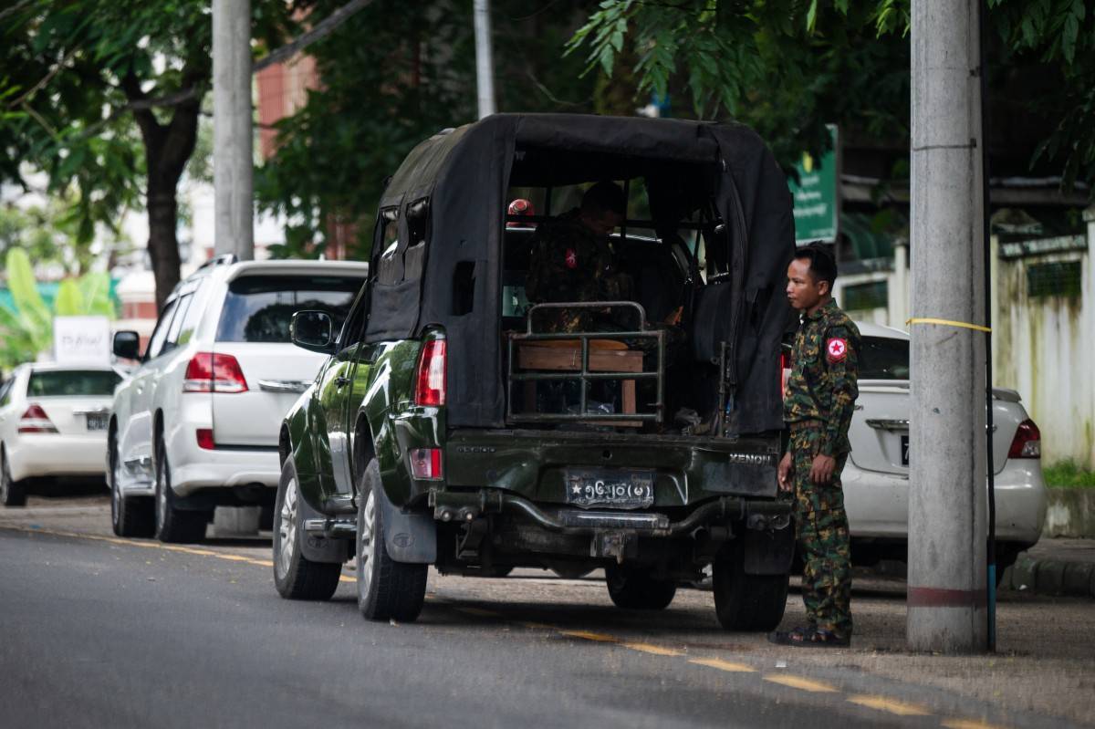 Member of Myanmar's military patrol on a street in Yangon on July 19, 2025, on the 78th Martyrs' Day that marks the anniversary of the assassination of independence leaders, including general Aung San, father of the currently deposed and imprisoned leader Aung San Suu Kyi. (Photo by AFP)