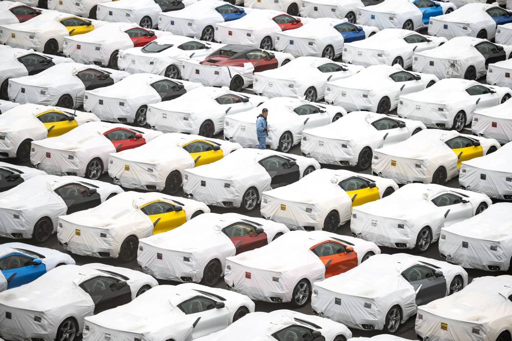New vehicles are parked at Daikoku Pier in Yokohama, south of Tokyo on April 11, 2025. US President Donald Trump ordered the reimposition of tariffs on dozens of trading partners on July 31, 2025 -- his cornerstone strategy for reshaping global trade to benefit the US economy. However in a minor reprieve, the White House said the measures will take effect in a week, not on August 1 as previously expected. (Photo by Philip FONG / AFP)