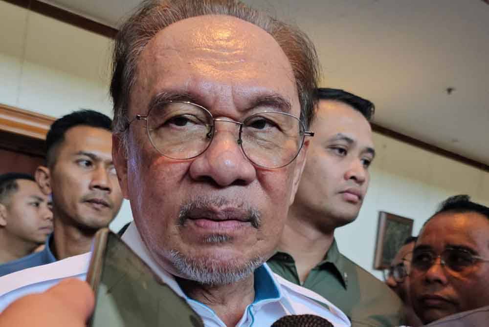 Prime Minister and PH chairman Datuk Seri Anwar Ibrahim after a meeting with PKR leaders in Sabah on Sunday.