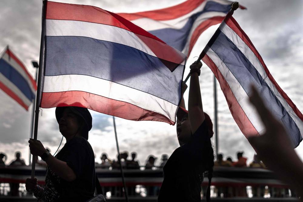 Anti-government protesters rally to demand the removal of Thailand's Prime Minister Paetongtarn Shinawatra from office at Victory Monument in Bangkok on June 28, 2025. (Photo by Chanakarn Laosarakham / AFP)
