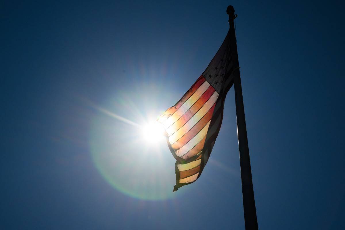 An American flag waves outside the stadium prior to the FIFA Club World Cup 2025 group D match between CR Flamengo and Chelsea FC at Lincoln Financial Field on June 20, 2025 in Philadelphia, Pennsylvania. - (Photo by David Ramos / Getty Images via AFP)